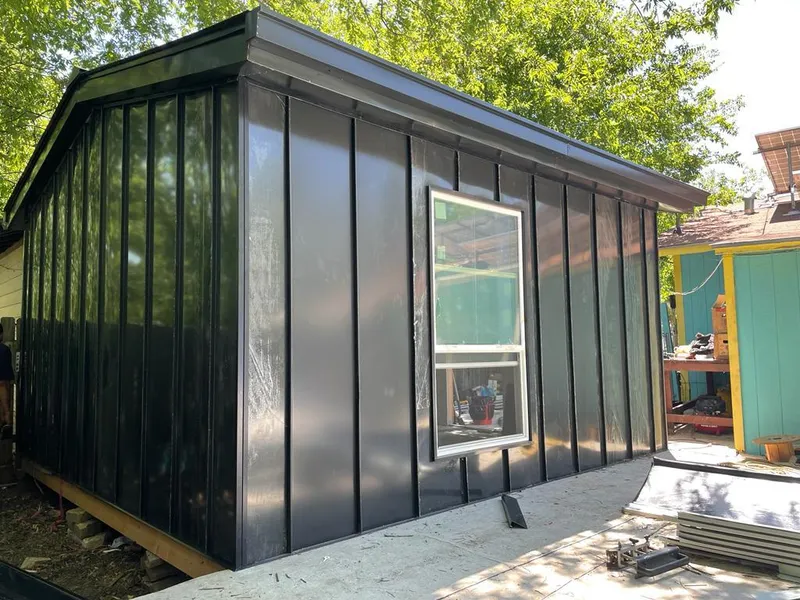 Black standing seam metal wall panels for Metal Roof Installation in Lacey