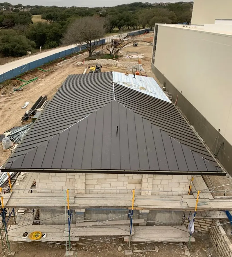 Metal roof new construction with scaffolding in Lacey